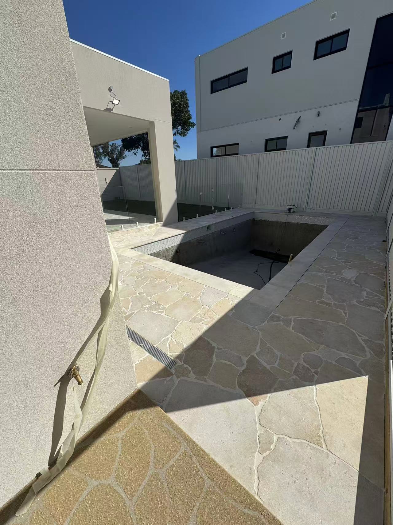 Swimming pool tiling installation